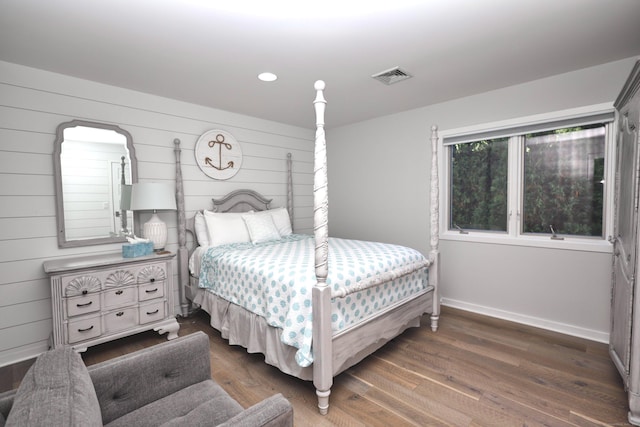 372 Maple Ave, Old Saybrook, CT 06475 - bedroom featuring wood finished floors, wooden walls, and recessed lighting