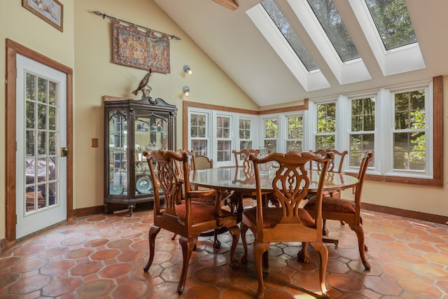 sunroom / solarium featuring a wealth of natural light and vaulted ceiling