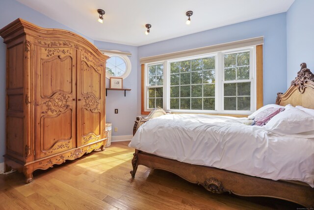 bedroom featuring light wood-type flooring