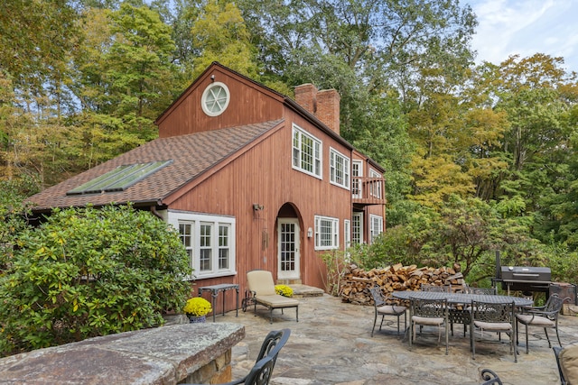 exterior space featuring a balcony and grilling area