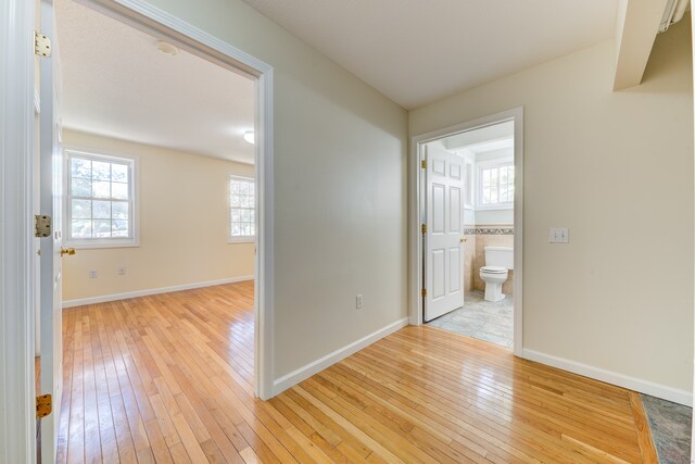 hallway featuring light wood-type flooring