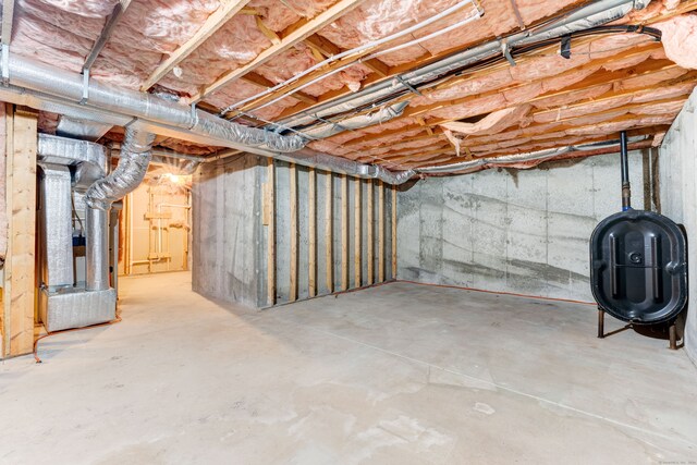 basement featuring heating unit