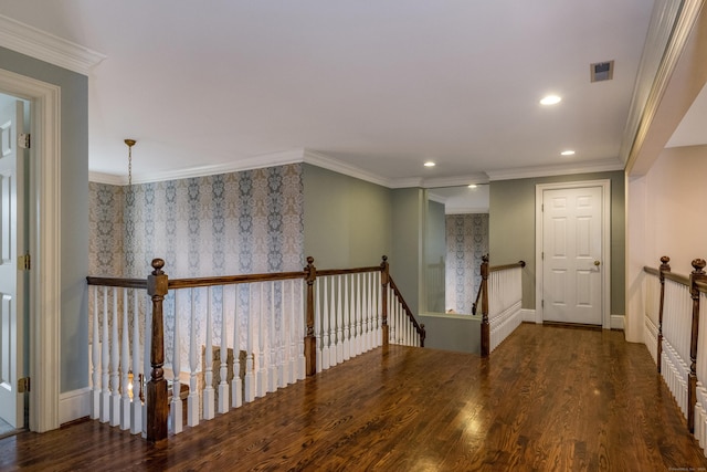 corridor with crown molding and dark wood-type flooring