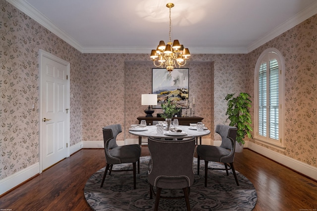 dining area featuring dark hardwood / wood-style floors and a chandelier