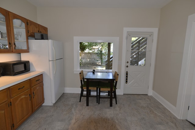 kitchen featuring white refrigerator