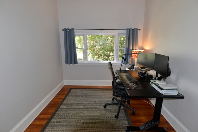 office area with dark hardwood / wood-style floors