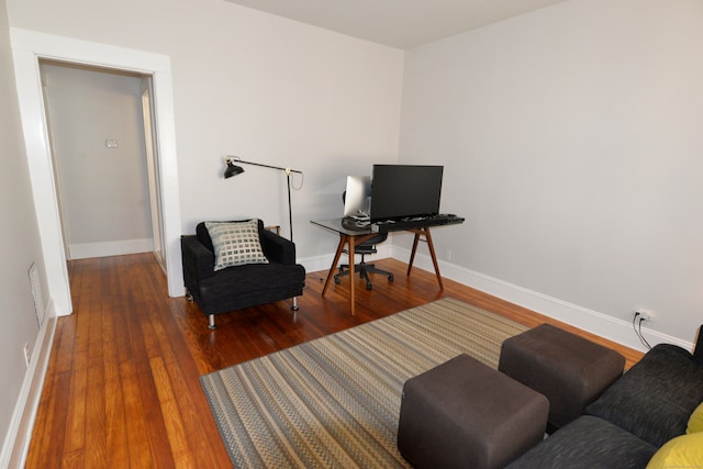 living area featuring dark hardwood / wood-style flooring