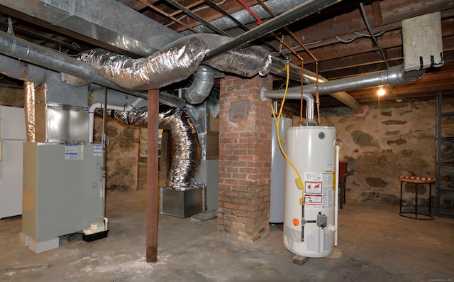 basement with gas water heater and heating unit