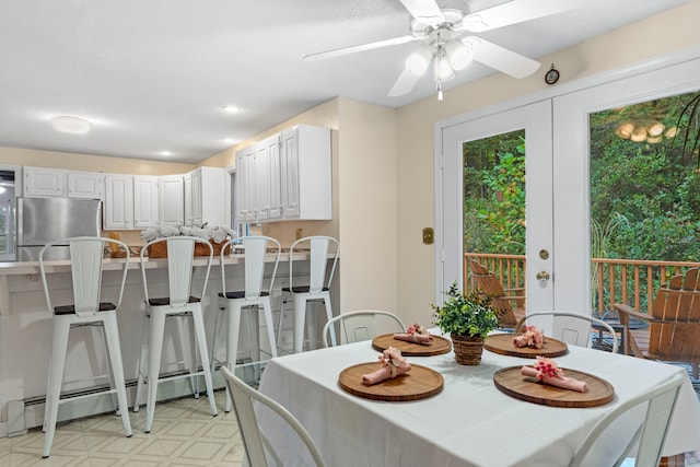 dining room featuring ceiling fan