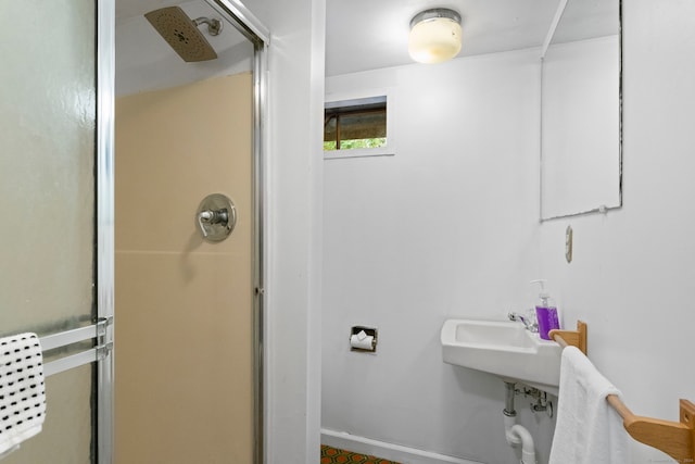 bathroom featuring an enclosed shower