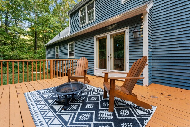 deck featuring a fire pit