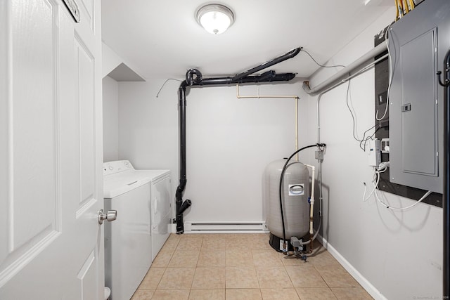 washroom with a baseboard radiator, light tile patterned flooring, laundry area, independent washer and dryer, and electric panel