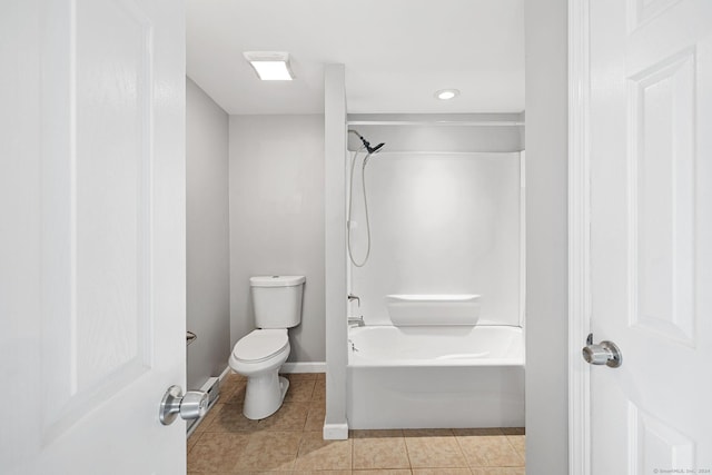 bathroom featuring toilet, shower / bathtub combination, baseboards, and tile patterned floors