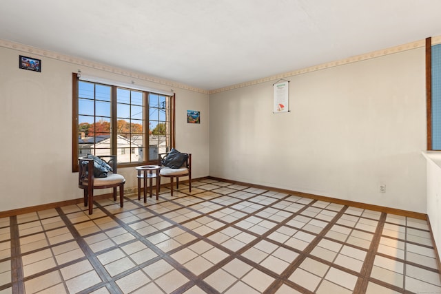 sitting room featuring tile patterned floors