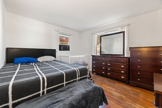 bedroom featuring hardwood / wood-style flooring