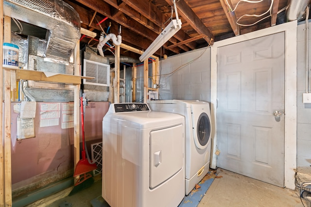 washroom featuring independent washer and dryer