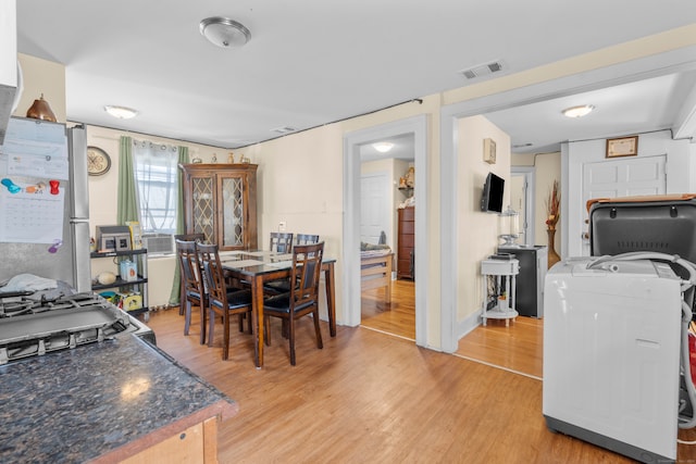 dining room featuring light wood-type flooring