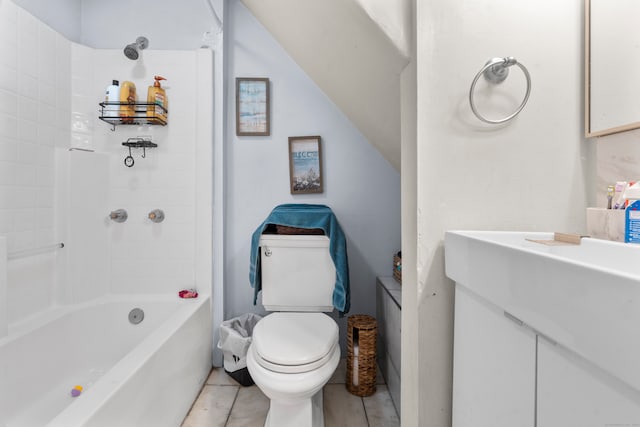 full bathroom featuring tile patterned floors, vanity, toilet, and tiled shower / bath