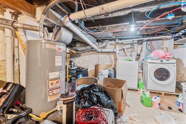 basement with gas water heater and separate washer and dryer