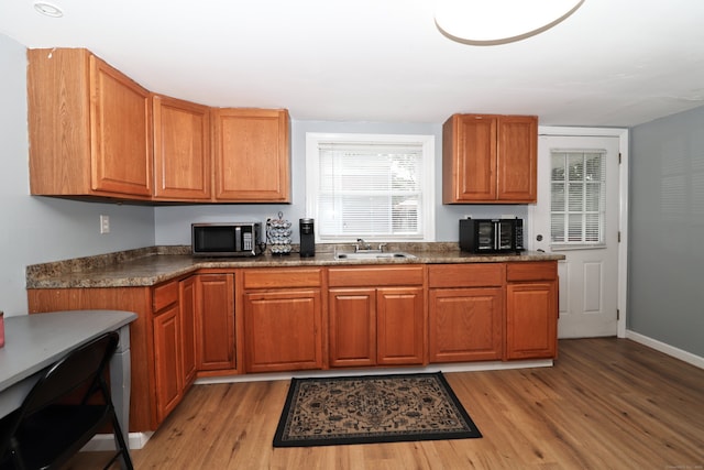 kitchen featuring sink and light hardwood / wood-style flooring