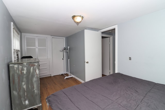 bedroom featuring hardwood / wood-style flooring