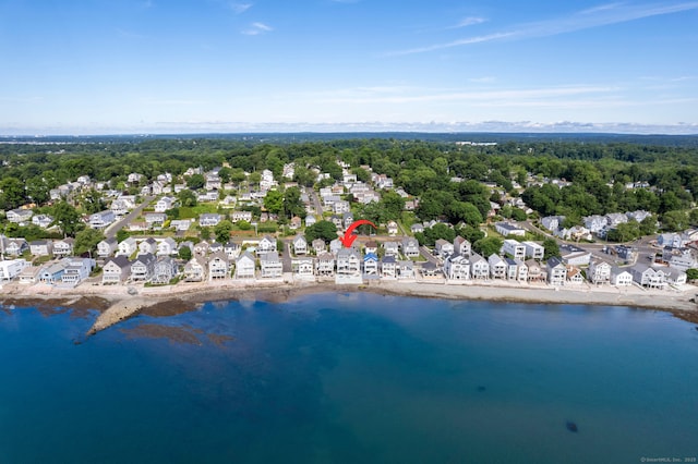 birds eye view of property featuring a water view and a residential view