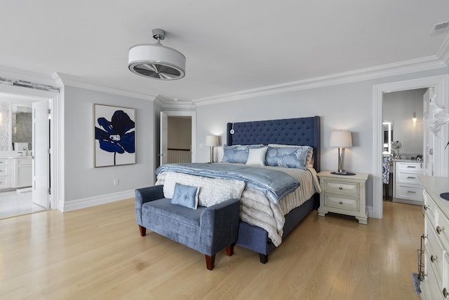 bedroom featuring ornamental molding, baseboards, visible vents, and light wood finished floors