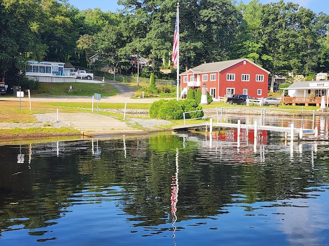 dock area with a water view