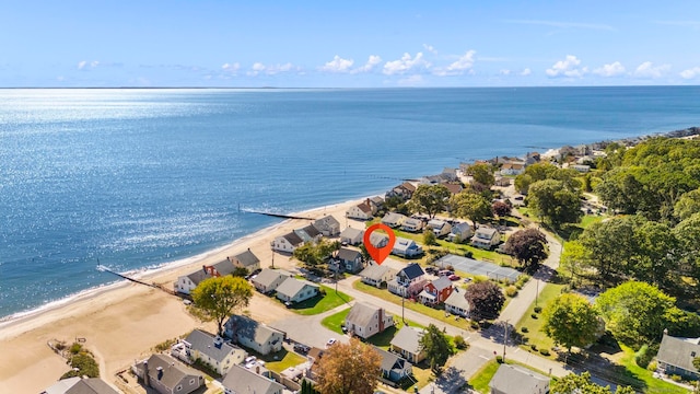 birds eye view of property featuring a view of the beach and a water view