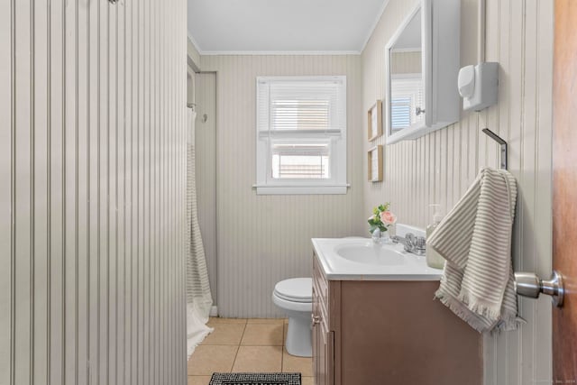 bathroom with vanity, ornamental molding, tile patterned floors, toilet, and a shower with shower curtain