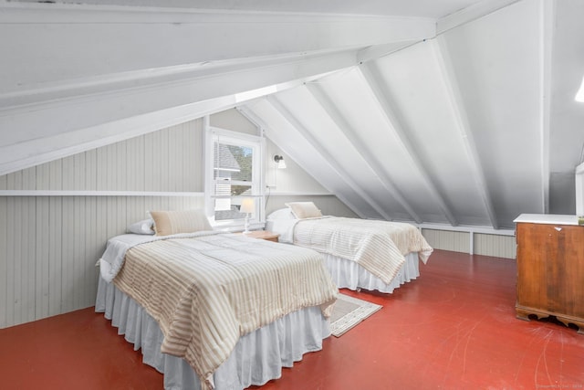 bedroom featuring lofted ceiling