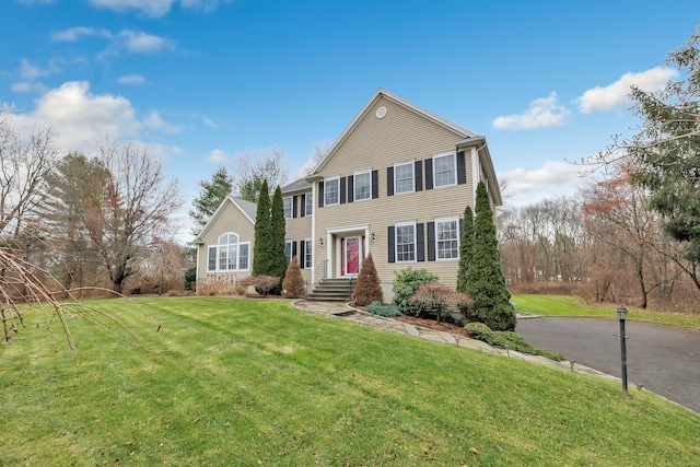 view of front of property with a front lawn