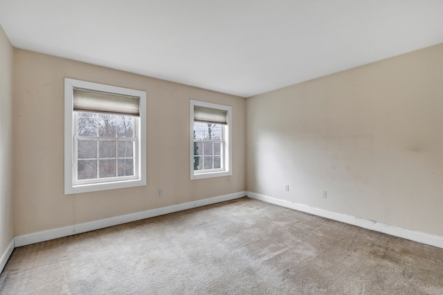 view of carpeted spare room