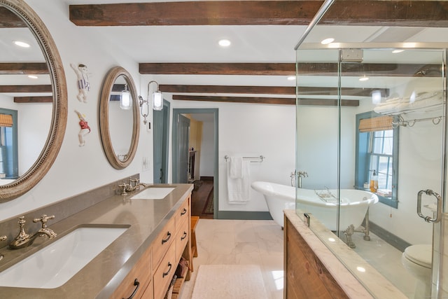 bathroom featuring beam ceiling, vanity, and plus walk in shower