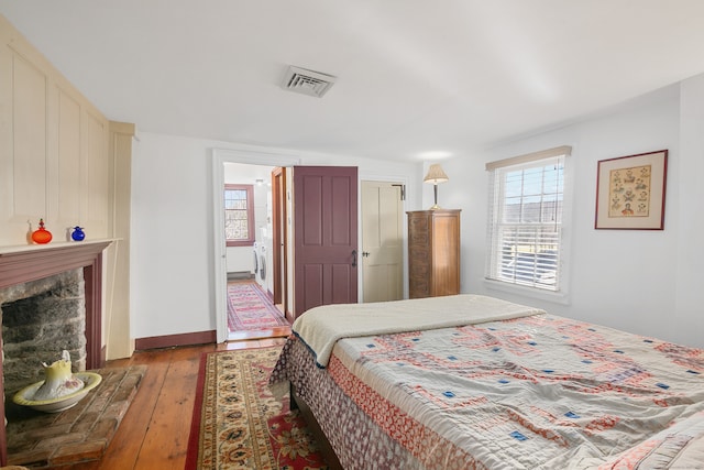 bedroom with wood-type flooring