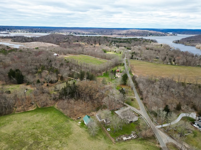 drone / aerial view with a water view and a rural view