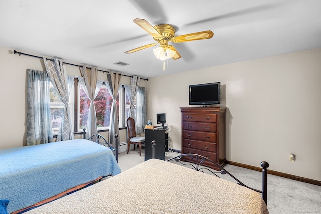 bedroom with light colored carpet and ceiling fan