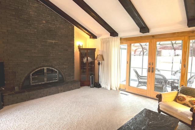 living room featuring carpet flooring, beam ceiling, a fireplace, and high vaulted ceiling