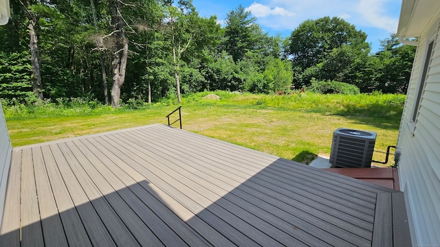 deck with cooling unit and a yard