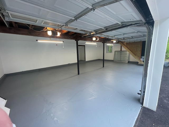 107 N Hollow Rd, Hartland, CT 06027 - below grade area featuring a garage and baseboards