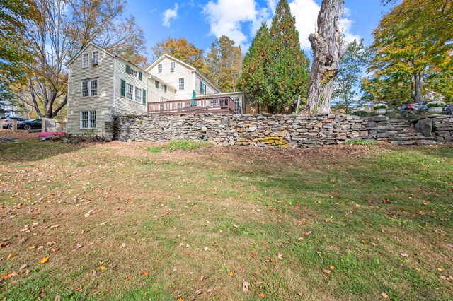 view of yard with a deck