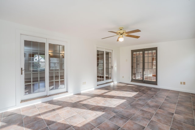 interior space featuring ceiling fan