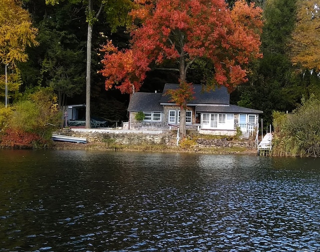 exterior space with a water view