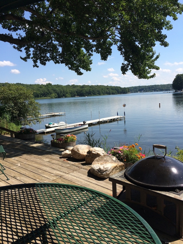 view of dock with a water view