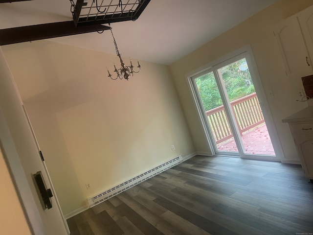 unfurnished dining area featuring a baseboard radiator, a chandelier, and dark hardwood / wood-style flooring