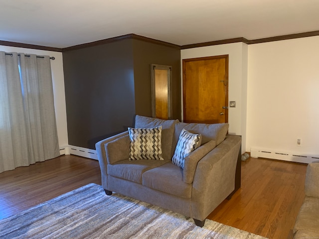 living room featuring ornamental molding, hardwood / wood-style floors, and a baseboard radiator