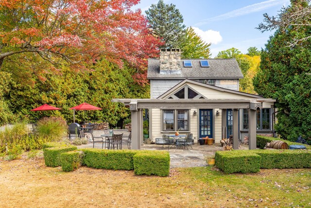 538 Wheelers Pt, Winchester, CT 06098 - rear view of property with a patio, roof with shingles, and a chimney