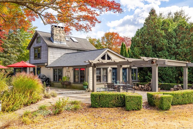 538 Wheelers Pt, Winchester, CT 06098 - back of property featuring a patio area, a chimney, and a pergola