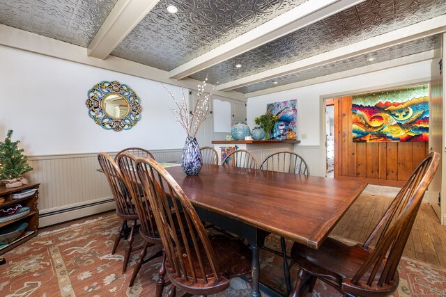 538 Wheelers Pt, Winchester, CT 06098 - dining area featuring beam ceiling, a baseboard radiator, wainscoting, an ornate ceiling, and wood finished floors