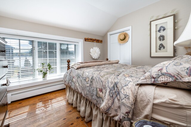538 Wheelers Pt, Winchester, CT 06098 - bedroom with baseboard heating, hardwood / wood-style flooring, lofted ceiling, and a closet